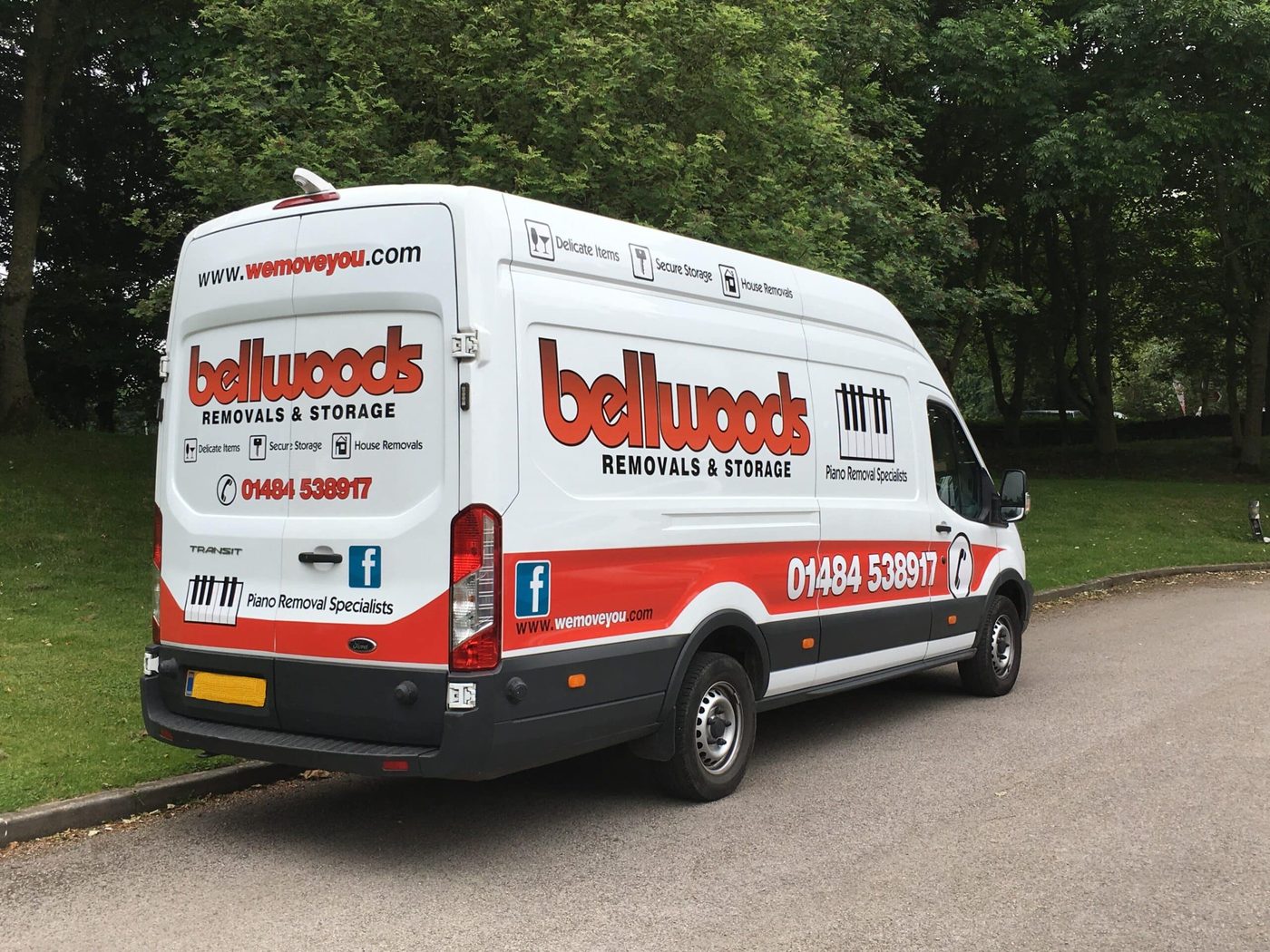 The rear of a liveried Bellwoods removal van