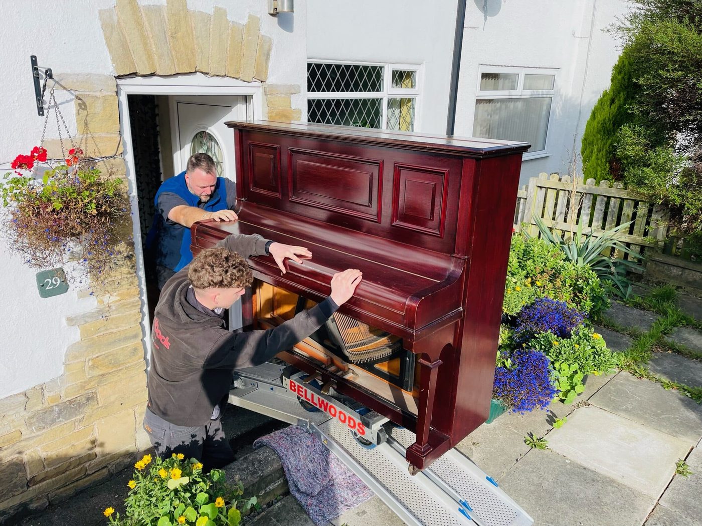 Bellwoods loading a grand piano for transport