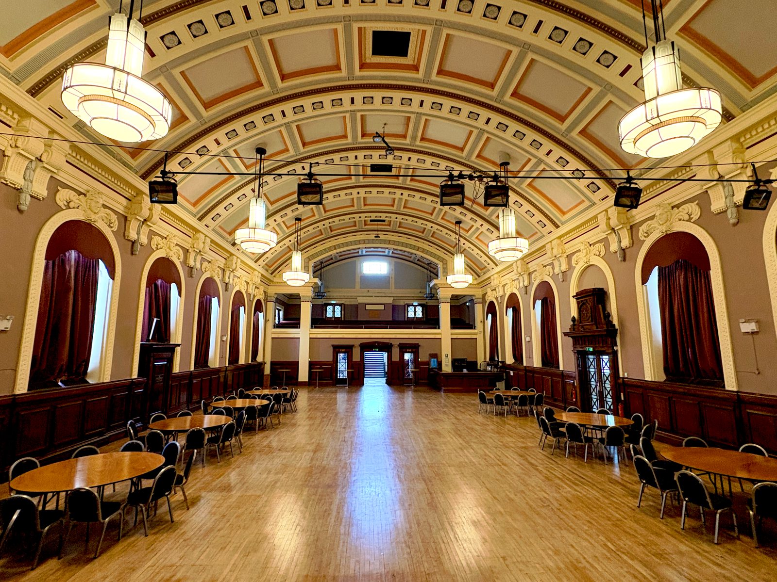 The Civic Hall at Wallasey Town Hall, with its barrel vaulted ceiling, oak panelling and stage